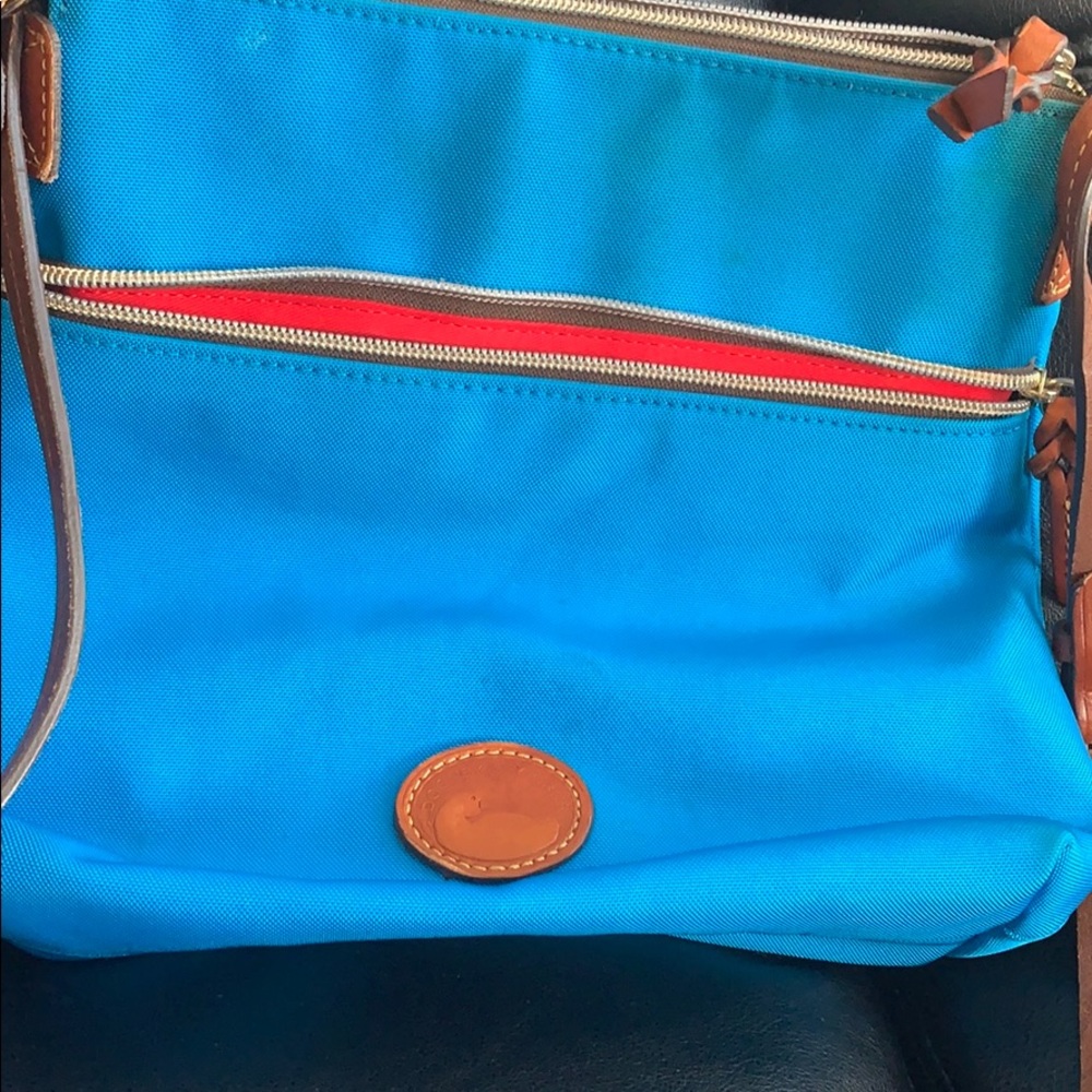 Bright blue dooney and Bourke crossbody